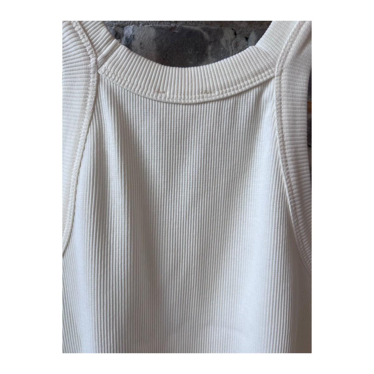 Ivory women's cropped racer top by Closed, close-up view showing fitted sleeveless design and soft fabric texture.