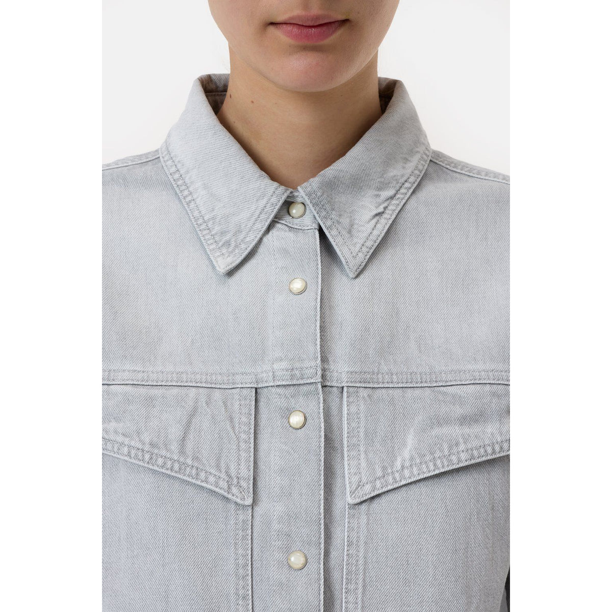 Light grey women's denim shirt by Closed Women's, featuring classic button-up design and casual fit.