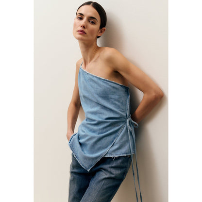 Light blue women's denim wrap top by Closed Women's, showing the fitted style and button-front design.