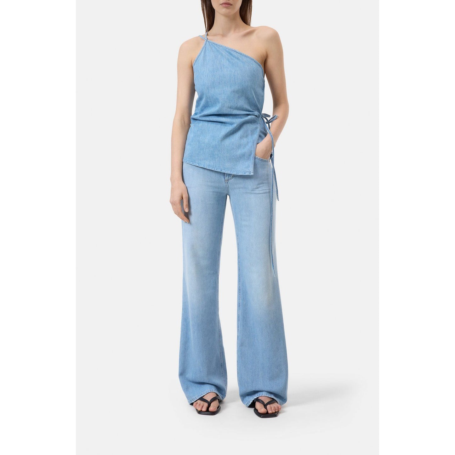 Light blue women's denim wrap top by Closed, featuring a fitted design and stylish wrap detail.