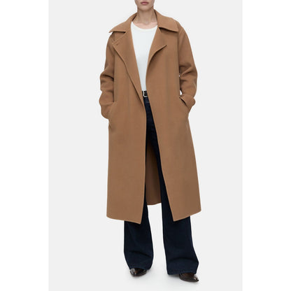 Women's DoubleFace Coat in Biscotti Brown by Closed, shown hanging on a wooden rack with a cozy, reversible design.