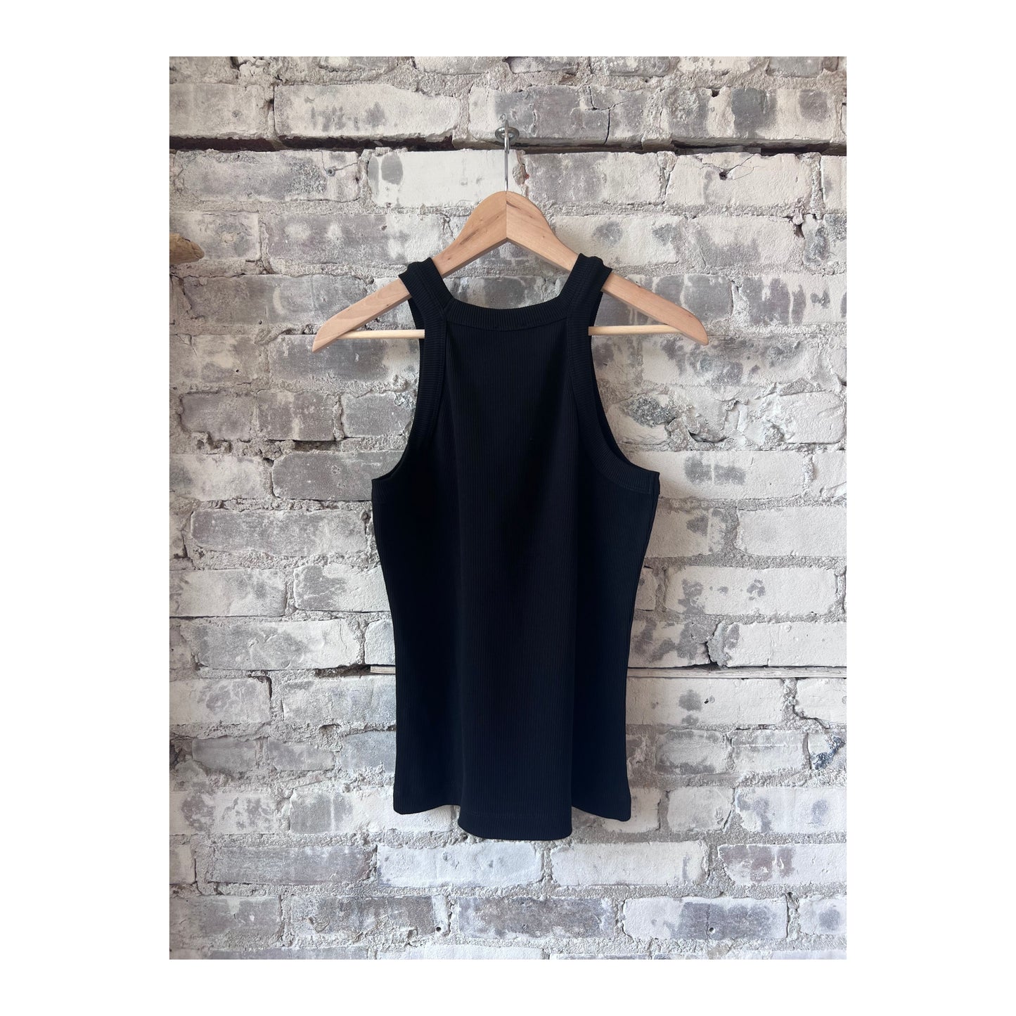 Black women's racer top from Closed Women's, featuring a fitted sleeveless design and stylish round neckline.