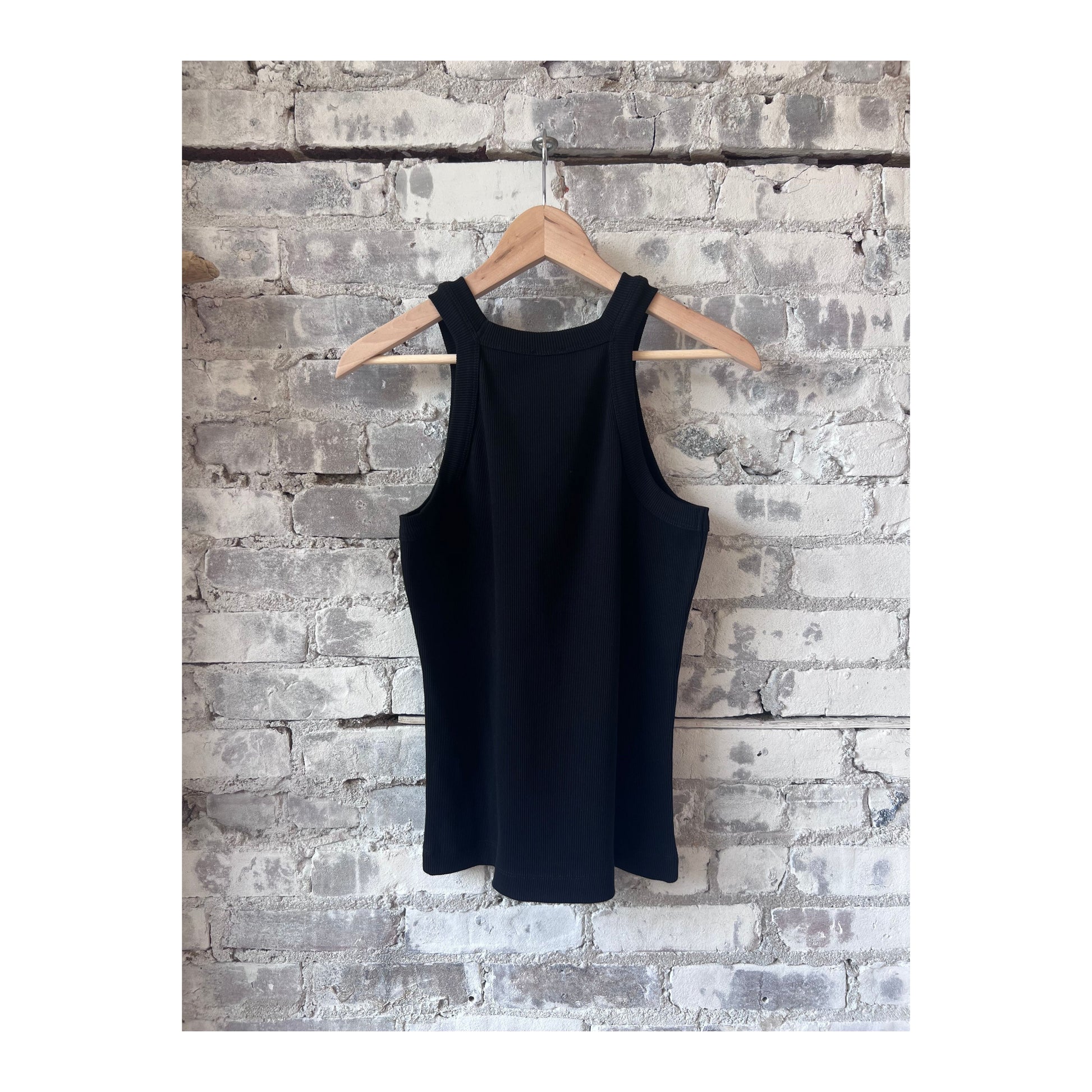 Black women's racer top from Closed Women's, featuring a fitted sleeveless design and stylish round neckline.
