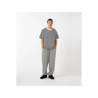 Men's black and navy COOLMAX stripe jersey tee by nanamica, featuring a comfortable, lightweight fabric and stylish striped design.