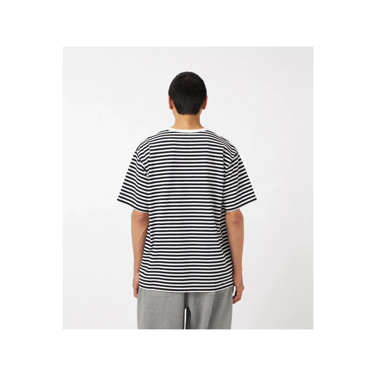 Men's black and navy COOLMAX stripe jersey tee by nanamica, featuring a stylish knit pattern and comfortable fit.