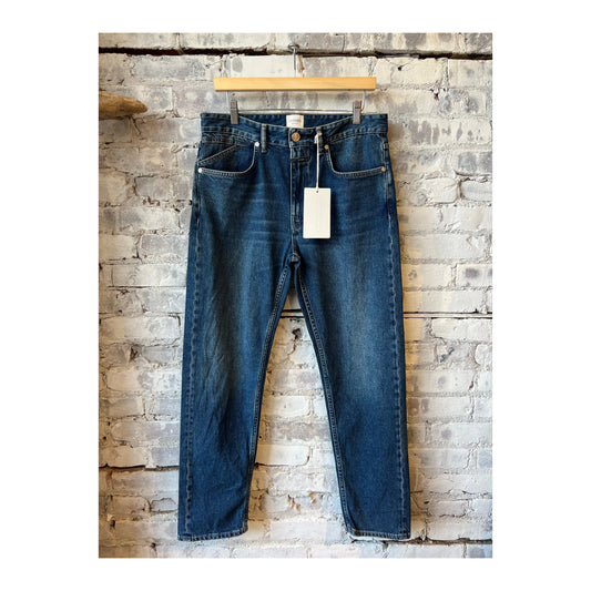 Men's Cooper True Comfort Stretch Jean in mid blue, showcasing slim fit denim with classic five-pocket design and subtle brand details.