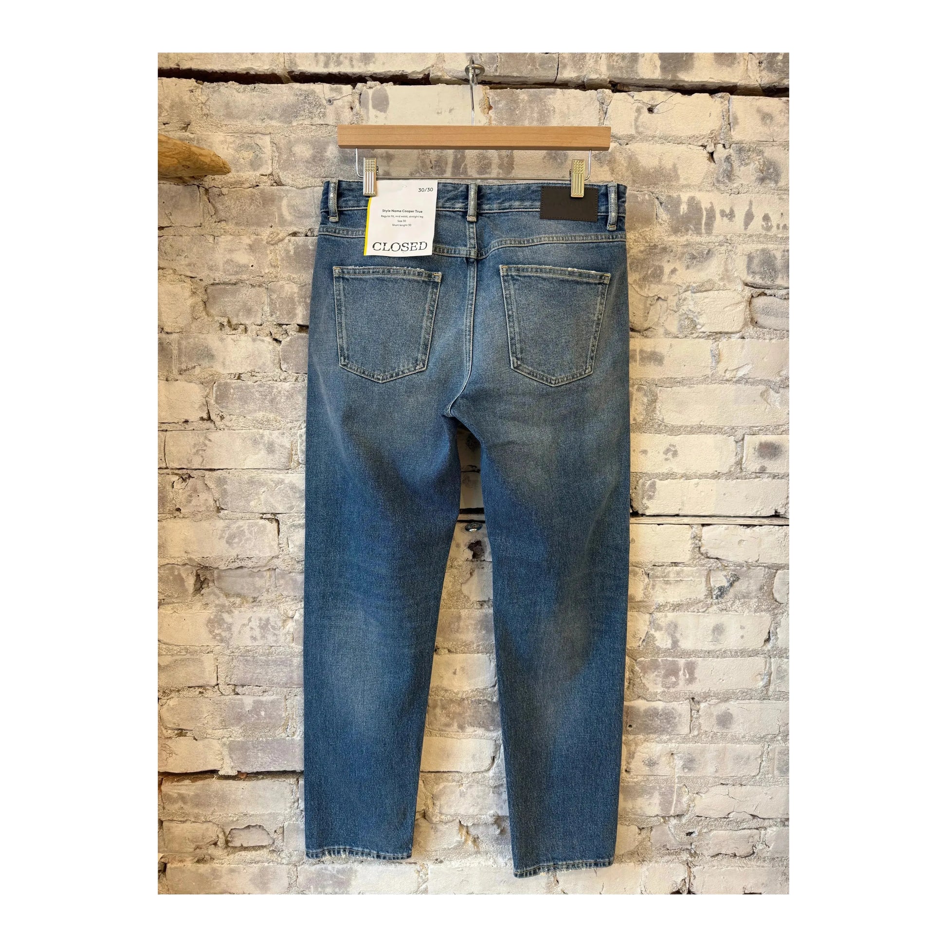 Men's Cooper True Comfort Stretch Regular Jean in mid blue, showcasing the fit and fabric texture of Closed Men's denim jeans.
