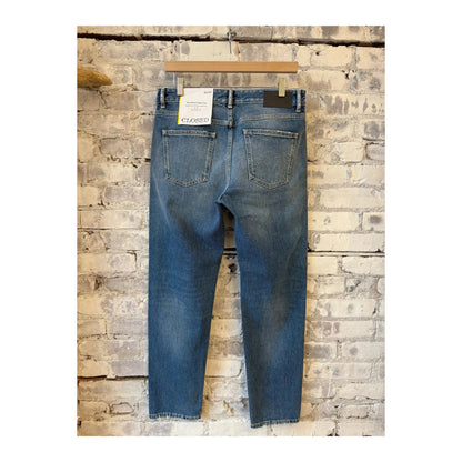 Men's Cooper True Comfort Stretch Regular Jean in mid blue, showcasing the fit and fabric texture of Closed Men's denim jeans.