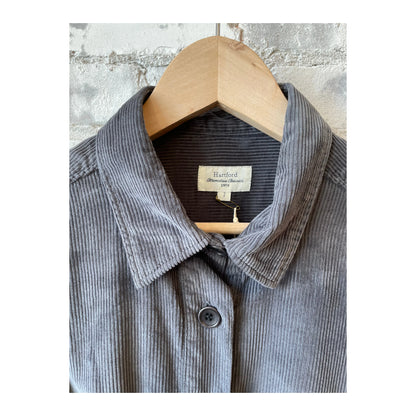 Charcoal Hartford Women's Corduroy Revol Dress displayed on a model featuring long sleeves and a fitted silhouette.