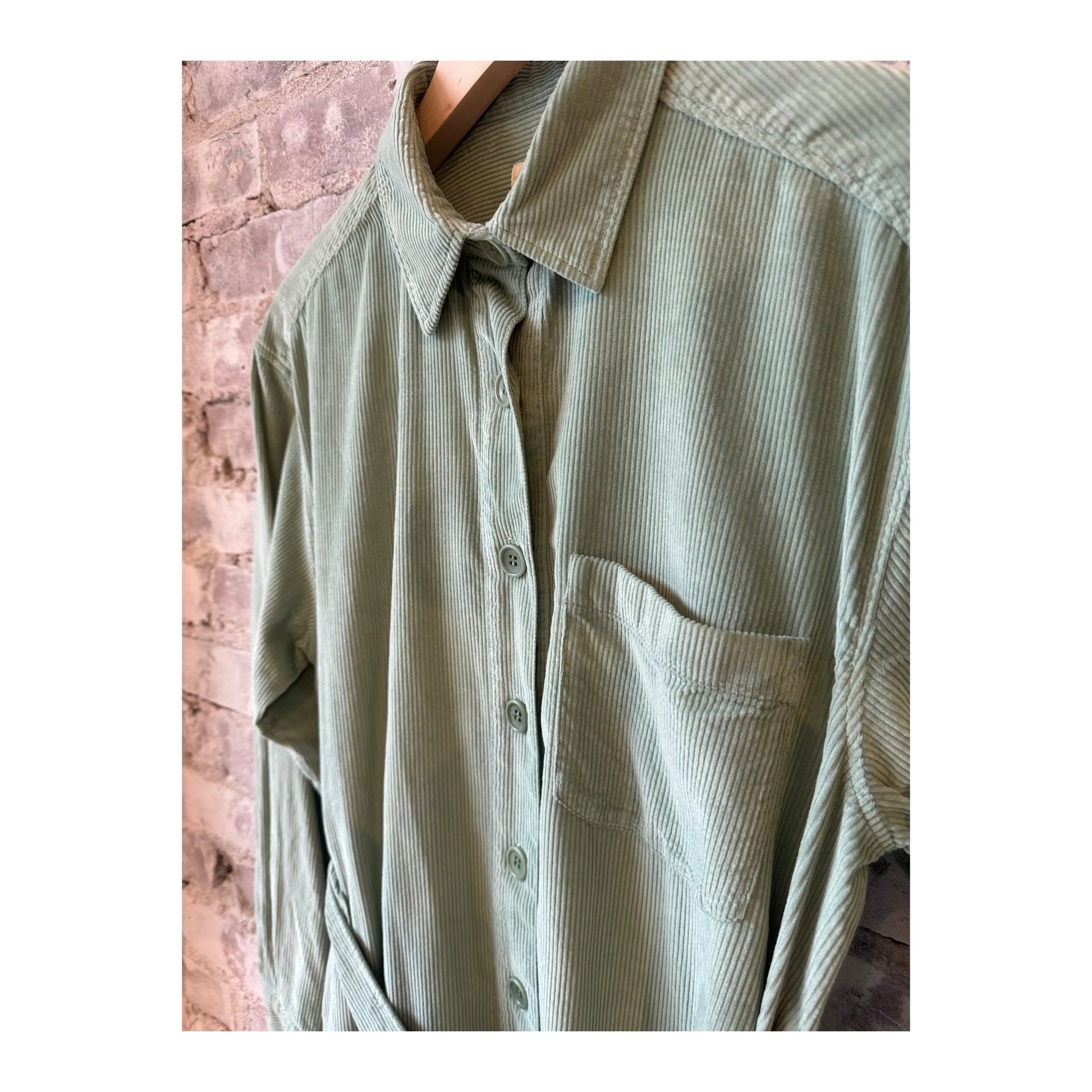 Hartford Women's Corduroy Revol Dress in jade, showcasing a stylish women's dress with a textured corduroy fabric and a fitted silhouette.