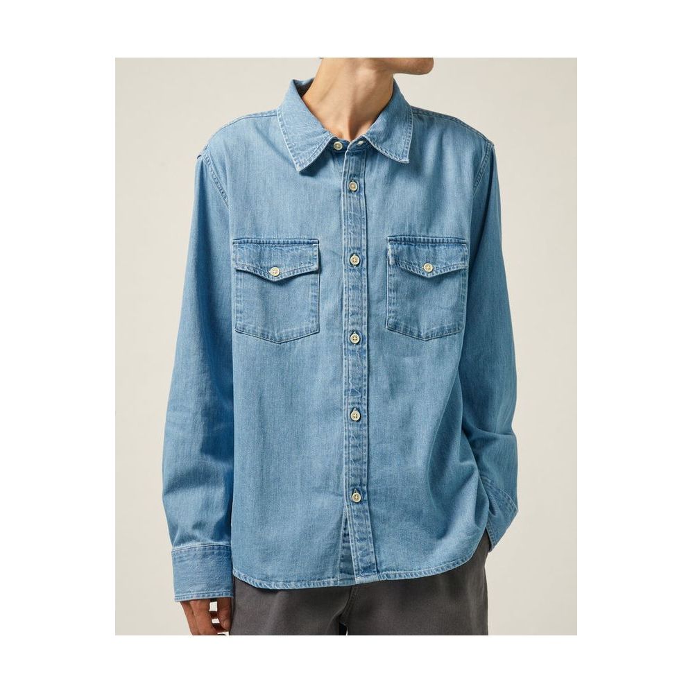 Men's light indigo denim shirt by Corridor, long sleeve casual shirt with button-front and classic fit.