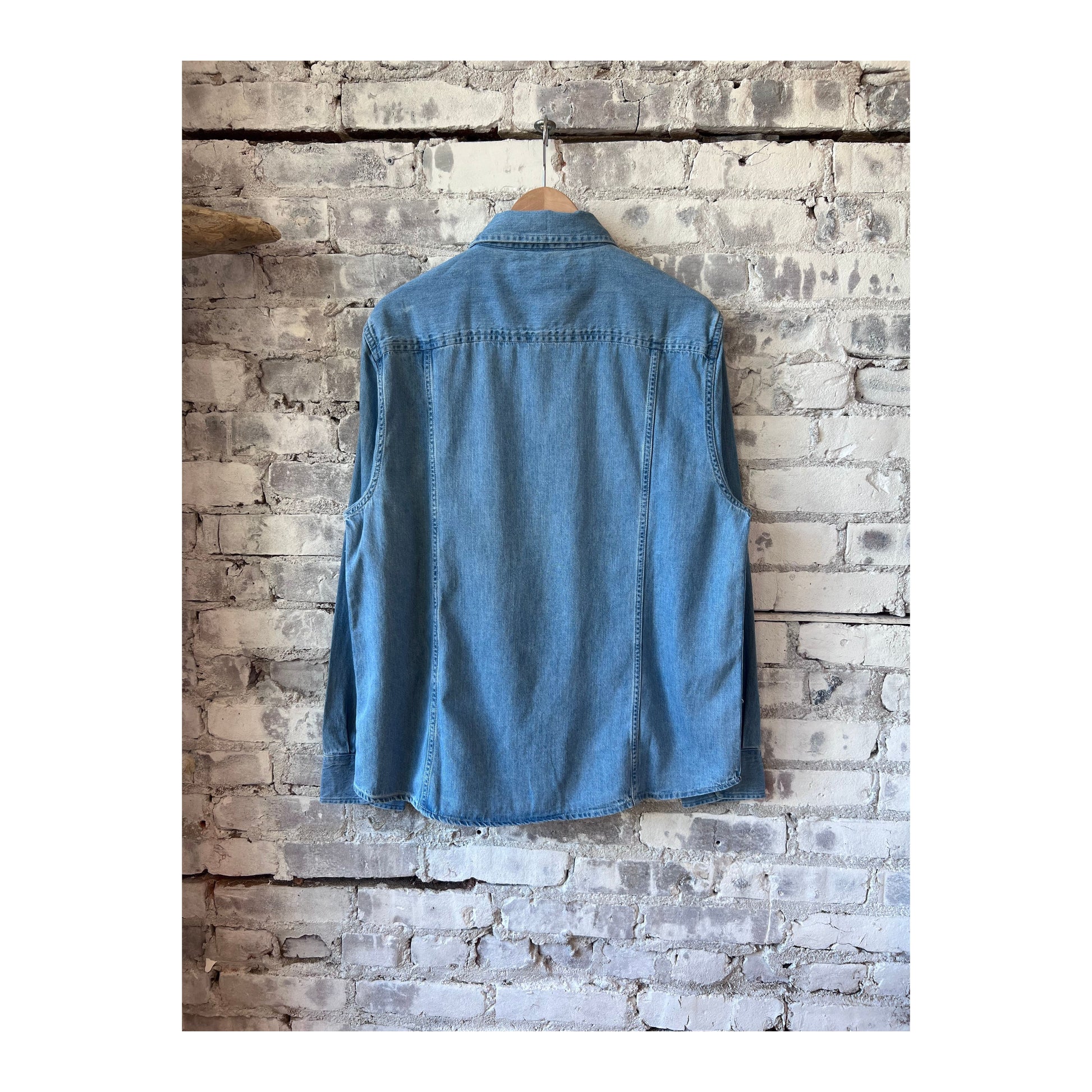 Men's light indigo denim shirt by Corridor, long sleeve casual shirt with classic button-up design.