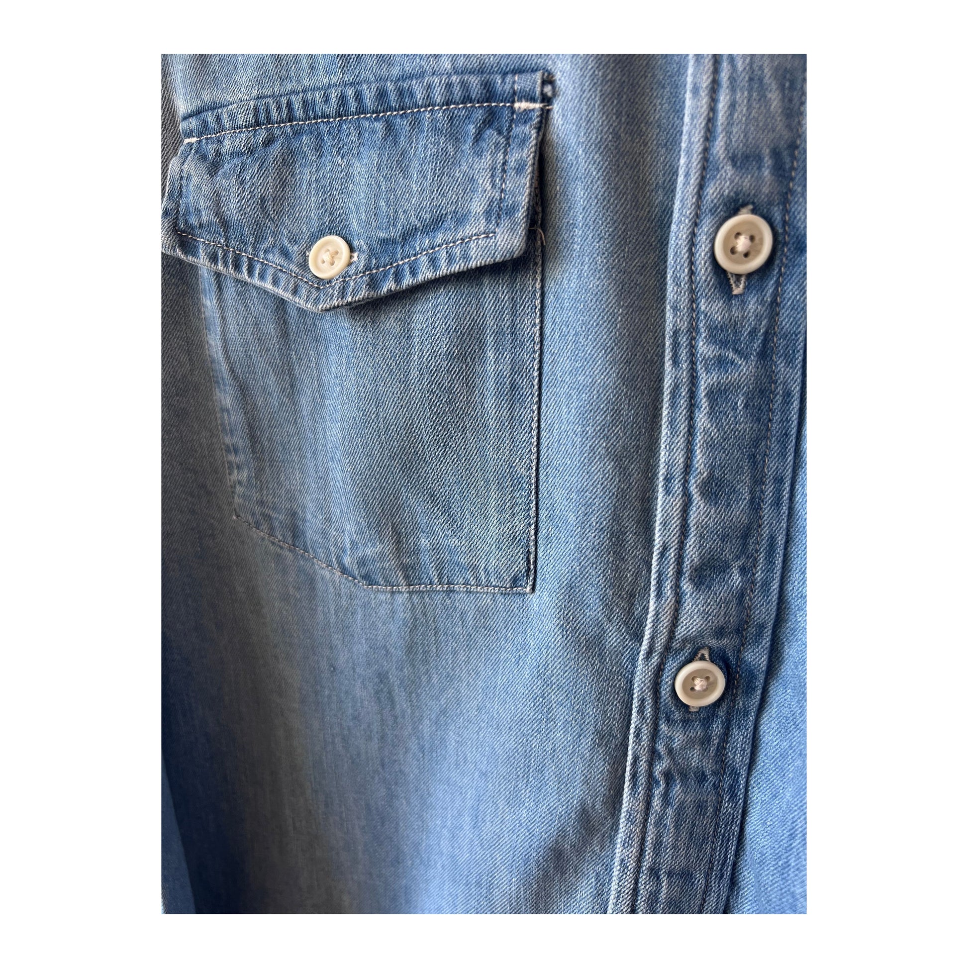 Men's light indigo denim shirt by Corridor, long-sleeve casual shirt with classic button-up design and chest pockets.