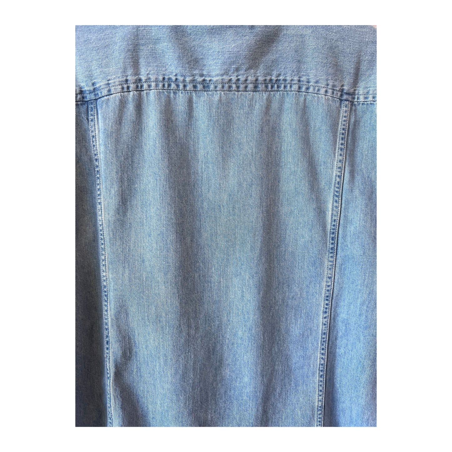 Men's light indigo denim shirt by Corridor, long-sleeve casual shirt shown on a model with chest pockets and button closure.