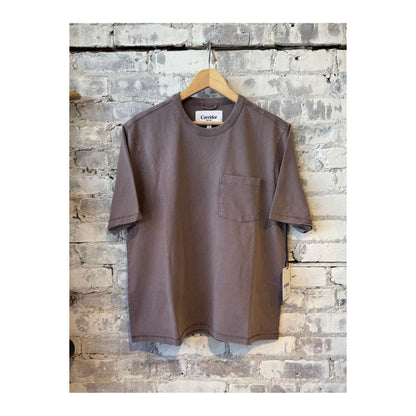 Men's garment dyed violet tee by Corridor, showcasing a soft, casual fabric with a relaxed fit and subtle color variation.