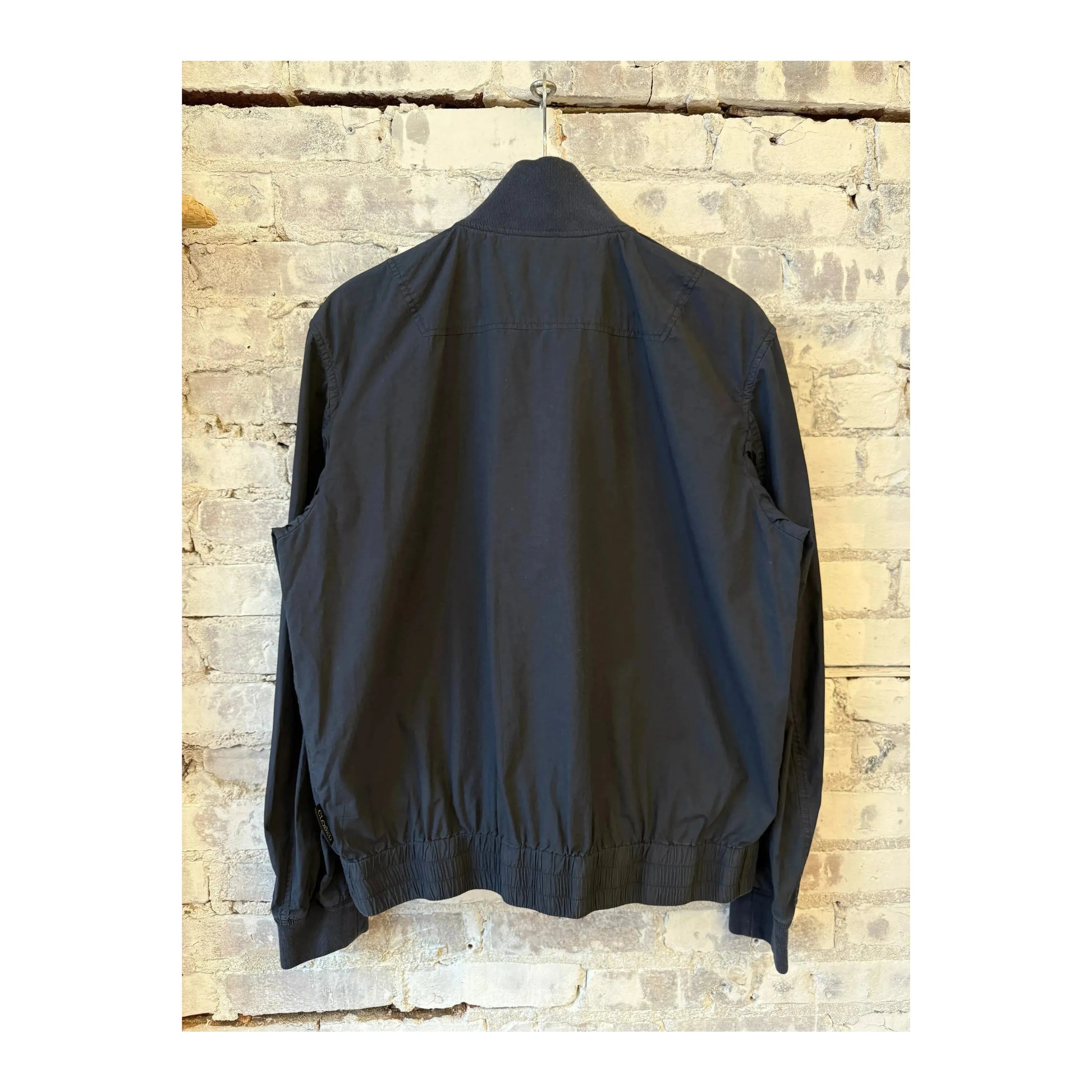 Men's cotton bomber jacket in smokey blue by Closed Men's, featuring a stylish fit and classic design.