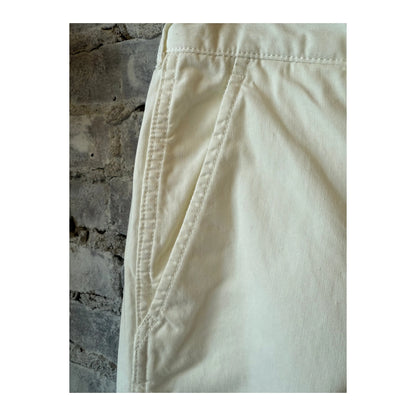 Men's off white Cotton Chino Cloth Peg Top Pants by Sage De Cret, featuring a relaxed fit and classic style.