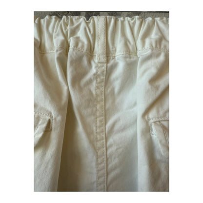 Men's off-white cotton chino peg top pants by Sage De Cret, featuring a relaxed fit and classic design.