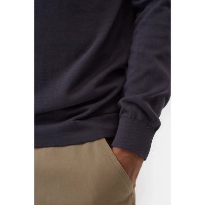 Men's cotton jumper in Magma Black by Closed Men's, showing a close-up of the black knit fabric and ribbed collar.