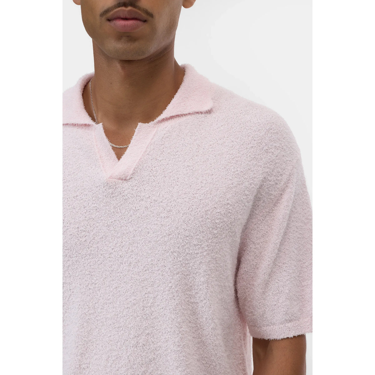Men's cotton knit polo shirt in quartz pink by Closed Men's, featuring a classic collar and short sleeves.