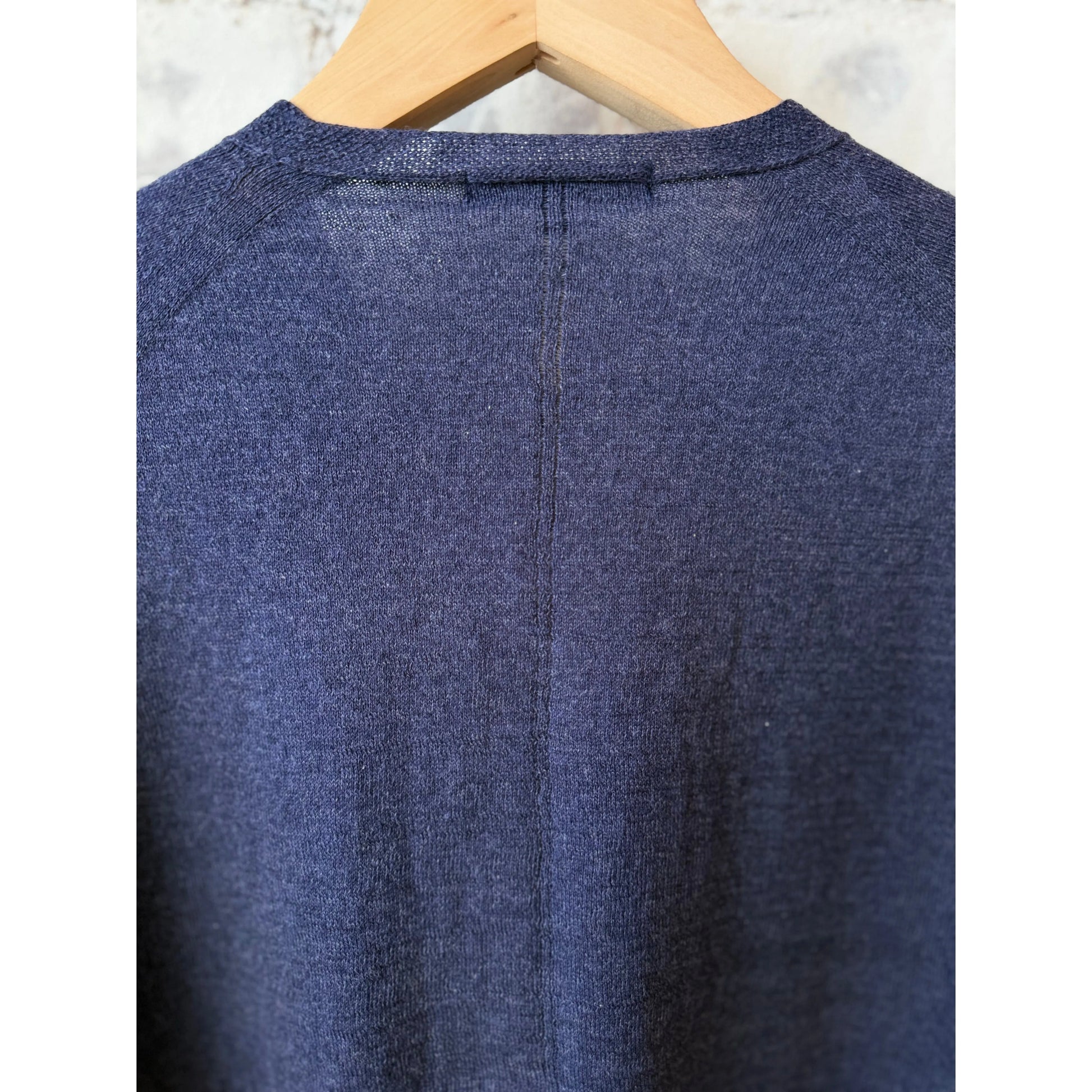Women's navy Cotton-Linen V-Neck Cardigan Sweater by Pas De Calais, showing the soft fabric and classic V-neck design.