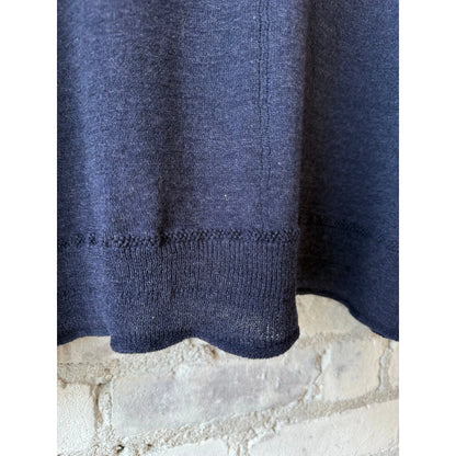 Women's navy cotton-linen V-neck cardigan sweater by Pas De Calais, shown in a close-up of the textured fabric and button details.