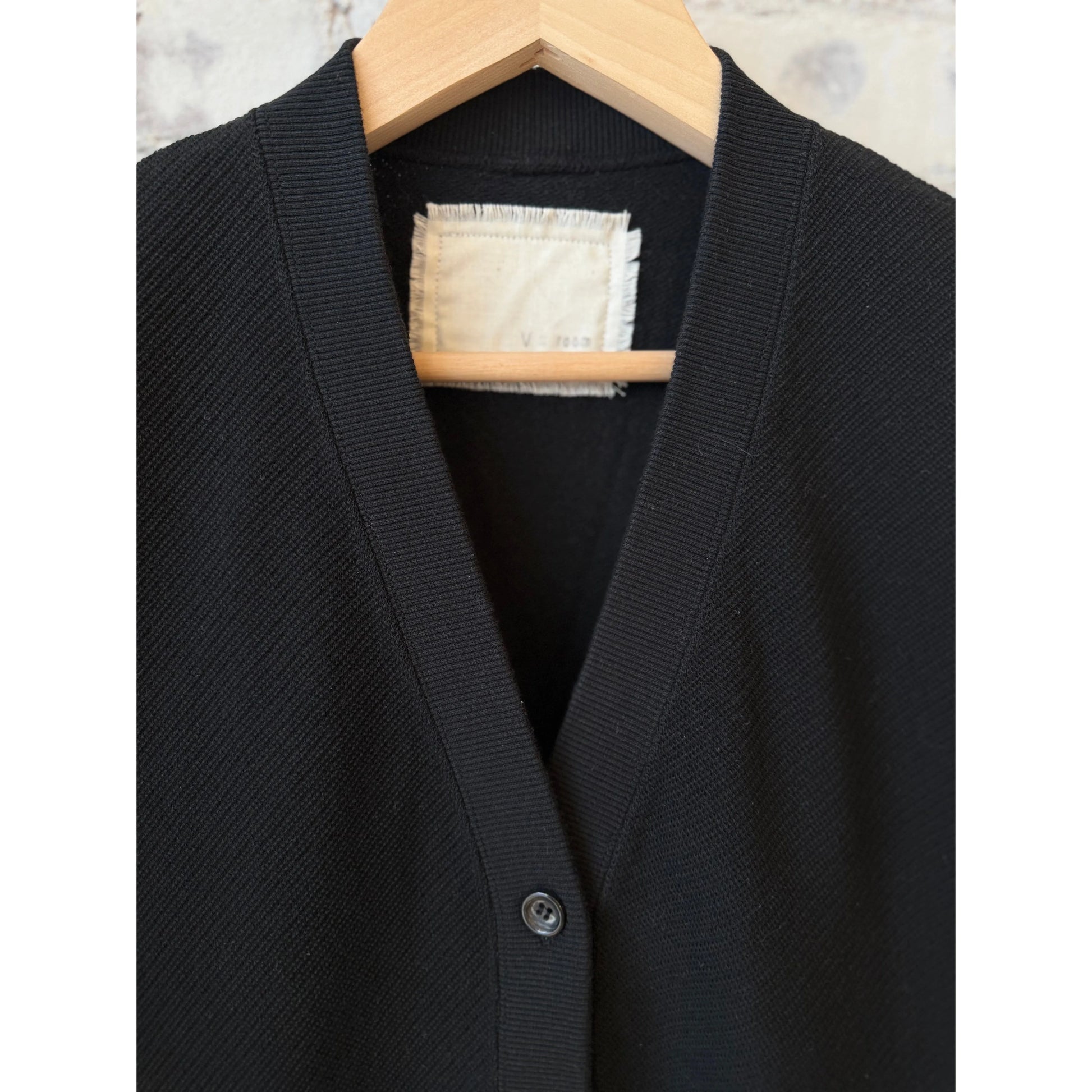 Black women's cotton mesh long-sleeve cardigan by V::Room, showing the lightweight, breathable knit fabric and relaxed fit.