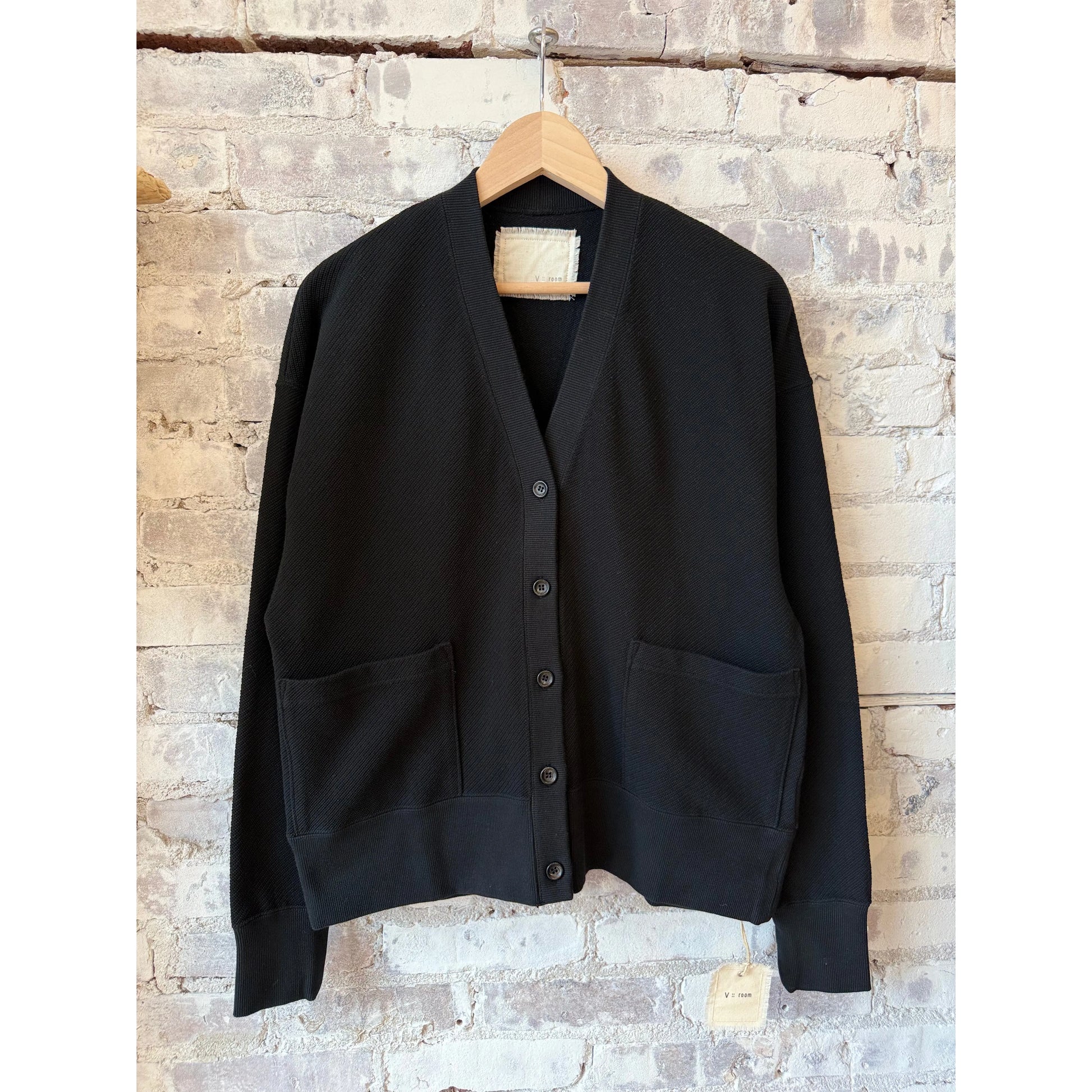 Black women's cotton mesh long-sleeve cardigan from V::Room, featuring lightweight, breathable fabric and a relaxed fit.