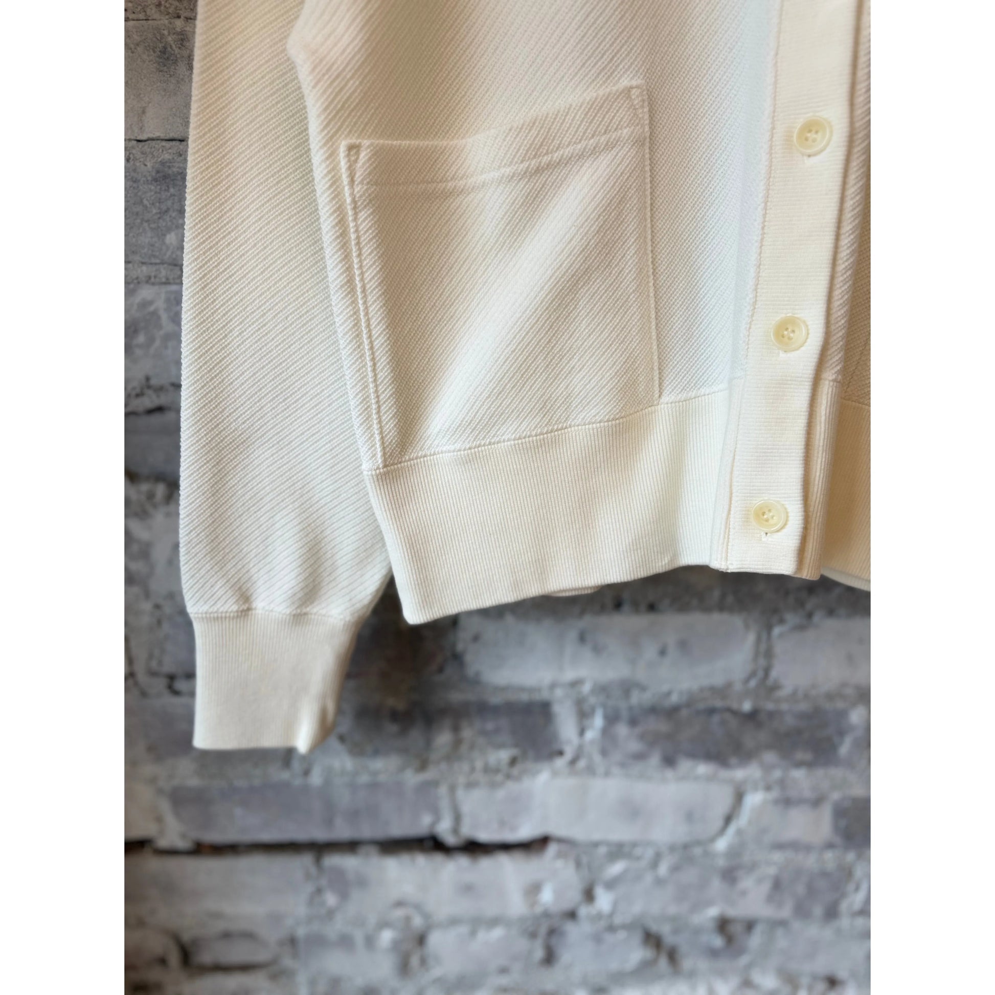White women's Cotton Mesh LS Cardigan by V::Room, showcasing lightweight, breathable knit with long sleeves and a relaxed fit.