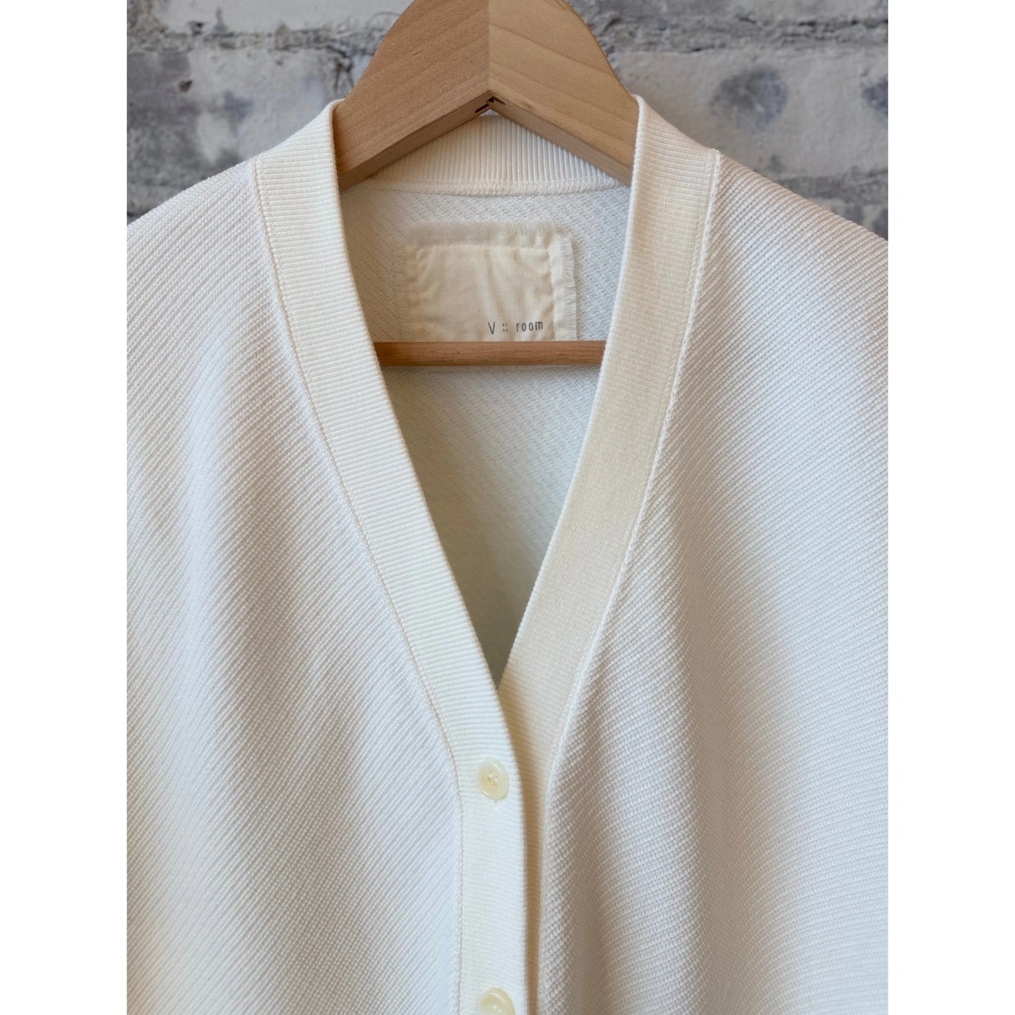 White women's Cotton Mesh LS Cardigan by V::Room, showing a lightweight, long-sleeve knit sweater with a mesh design.