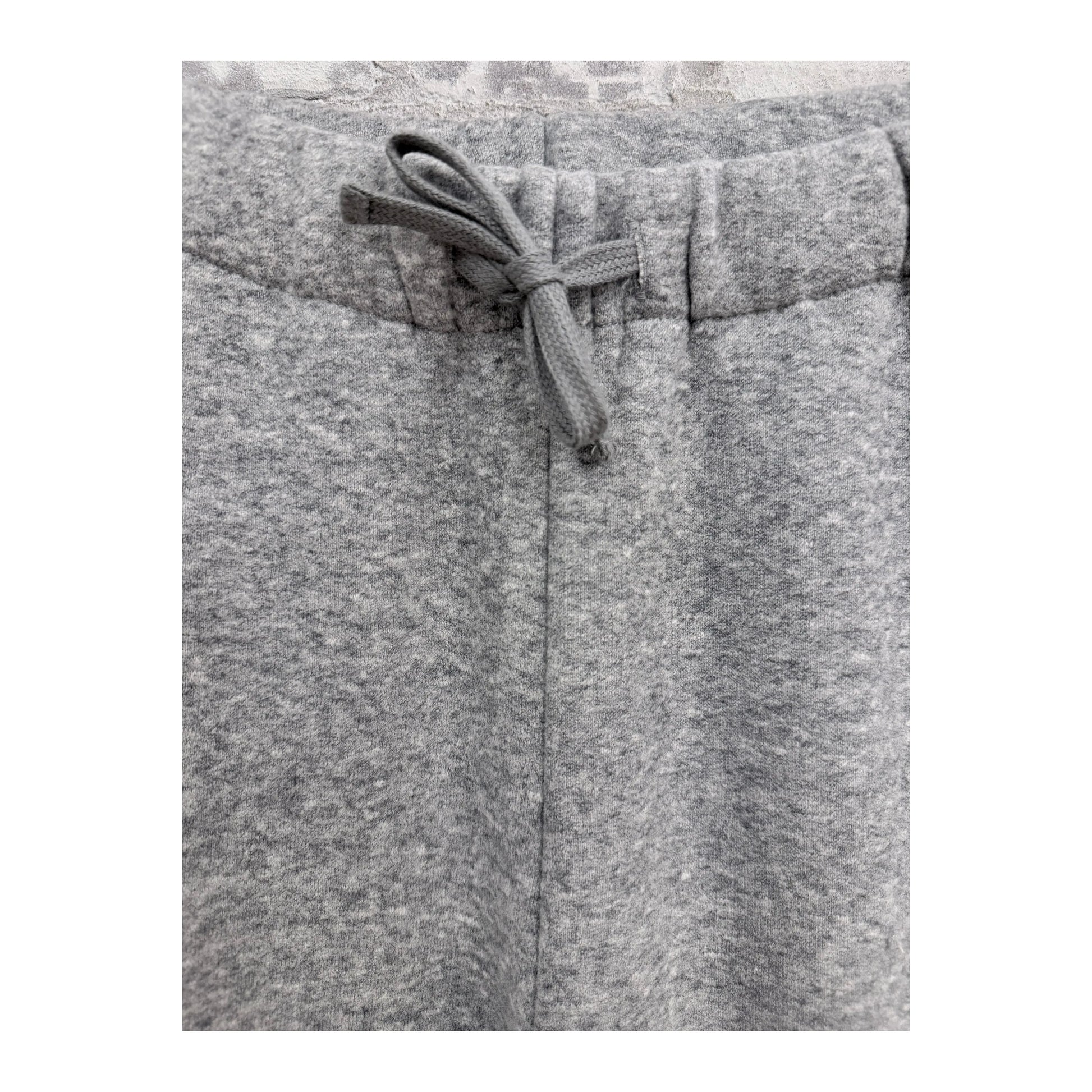 Women's Heather Charcoal Cotton Tencel Brushed Fleece Joggers by V::Room, showing the soft, cozy fleece fabric and relaxed fit.