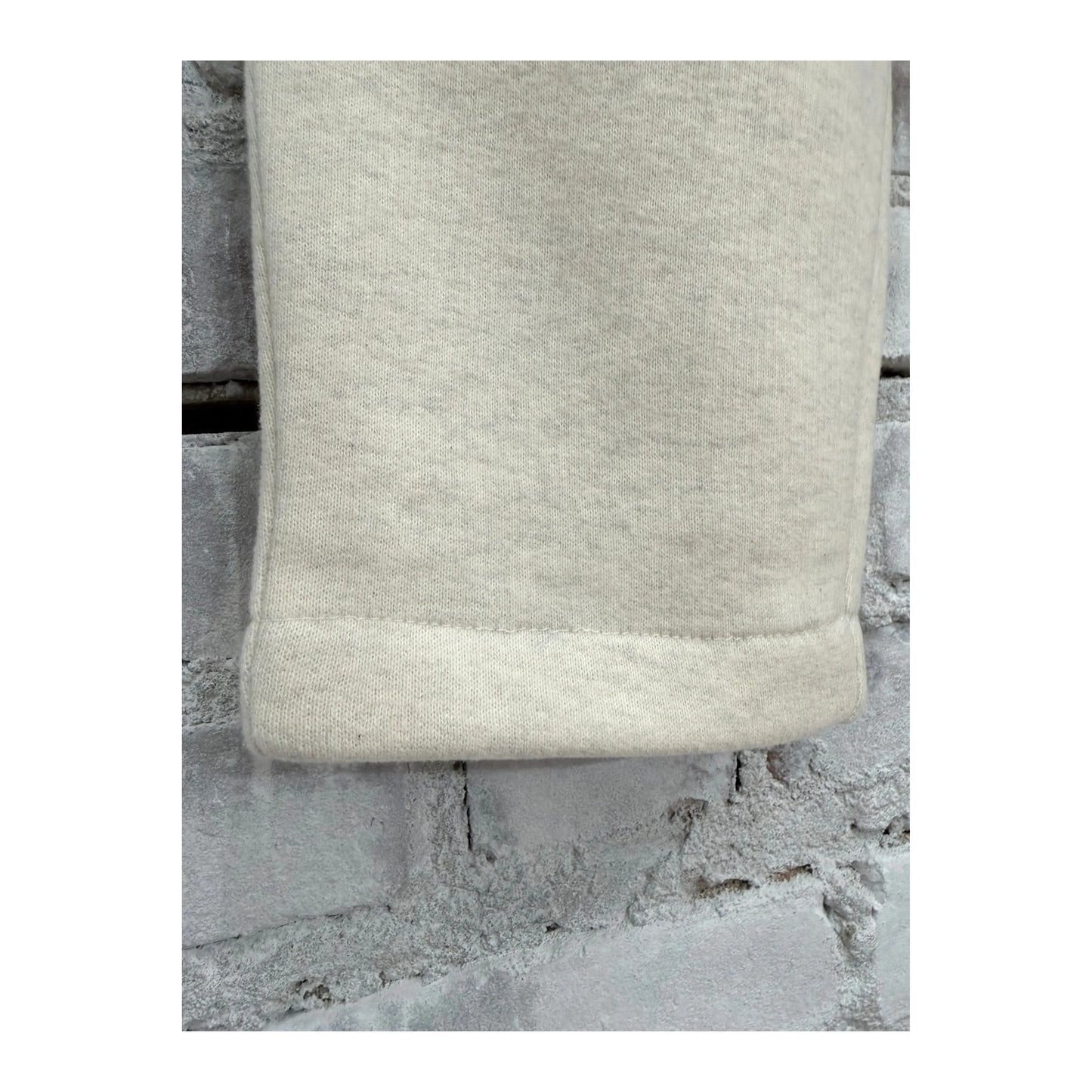 Women's V::Room Cotton Tencel brushed fleece jogger in oat color, showing a comfortable fit and soft fabric texture.