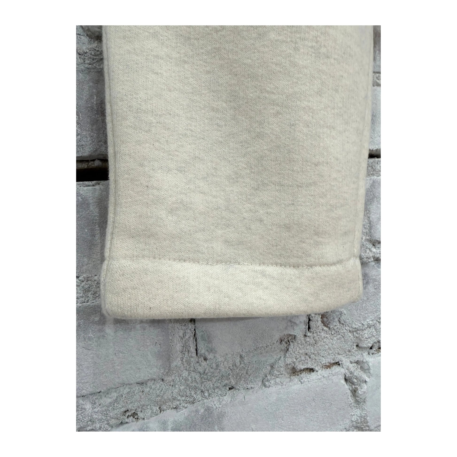 Women's V::Room Cotton Tencel brushed fleece jogger in oat color, showing a comfortable fit and soft fabric texture.
