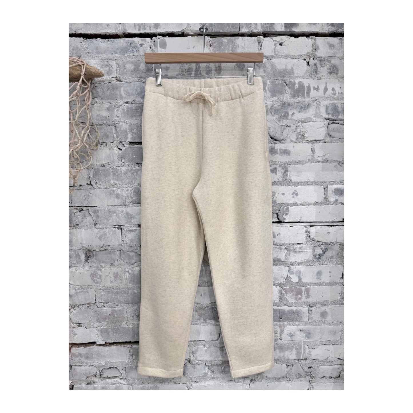 Women's cotton Tencel brushed fleece joggers in oat color, relaxed fit, soft fabric, V::Room brand, casual loungewear.