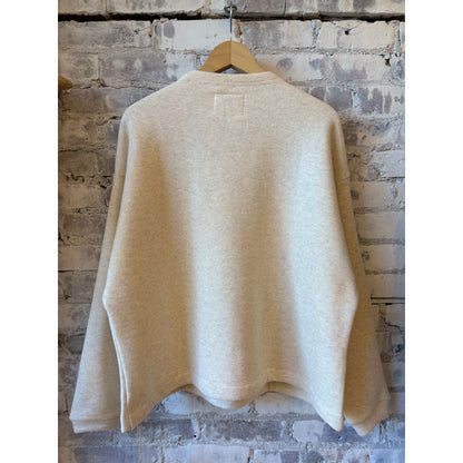 Women's oversized V::Room cotton Tencel brushed fleece long sleeve crew in oatmeal, showcasing the cozy, relaxed fit and soft fabric.