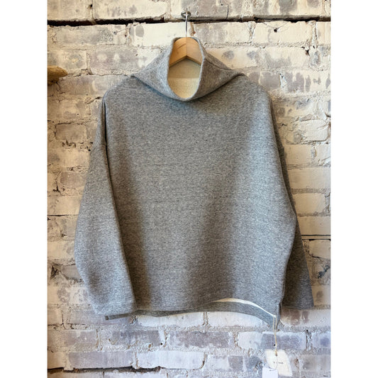 Women's oversized Heather Charcoal turtleneck sweater made of Cotton Tencel brushed fleece by V::Room, showcasing its cozy, relaxed fit.