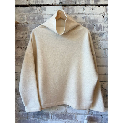 Women's oversized oatmeal turtleneck sweater by V::Room, made of soft cotton Tencel brushed fleece fabric.