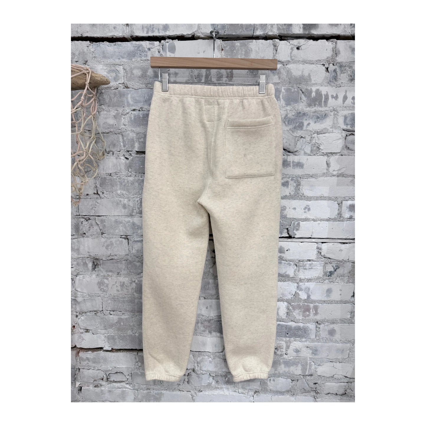 Men's V::Room Cotton Tencel Brushed Fleece SweatPant in oat color, showing relaxed fit and soft fleece fabric.