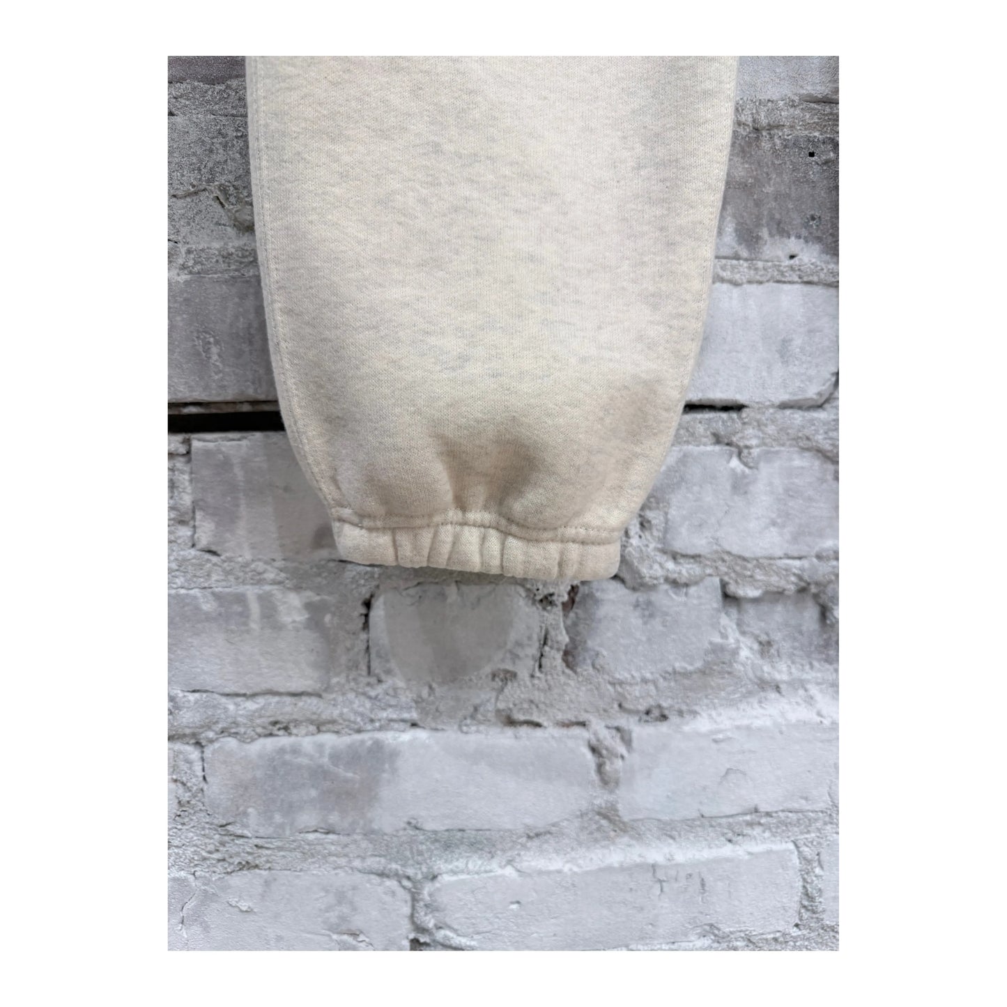 Men's V::Room Cotton Tencel brushed fleece sweatpants in oat color, showing a comfortable fit and soft fabric texture.