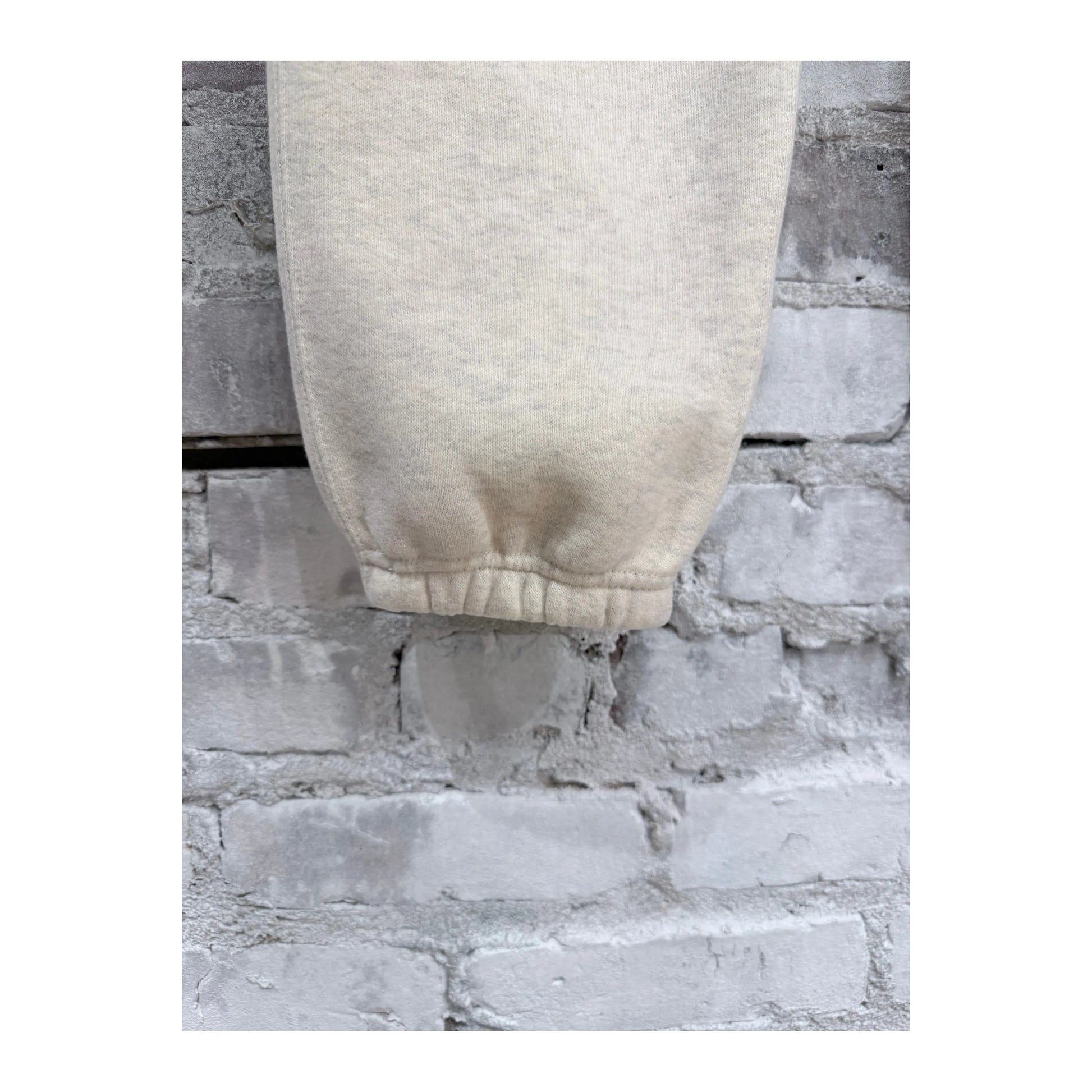 Men's V::Room Cotton Tencel brushed fleece sweatpants in oat color, showing a comfortable fit and soft fabric texture.