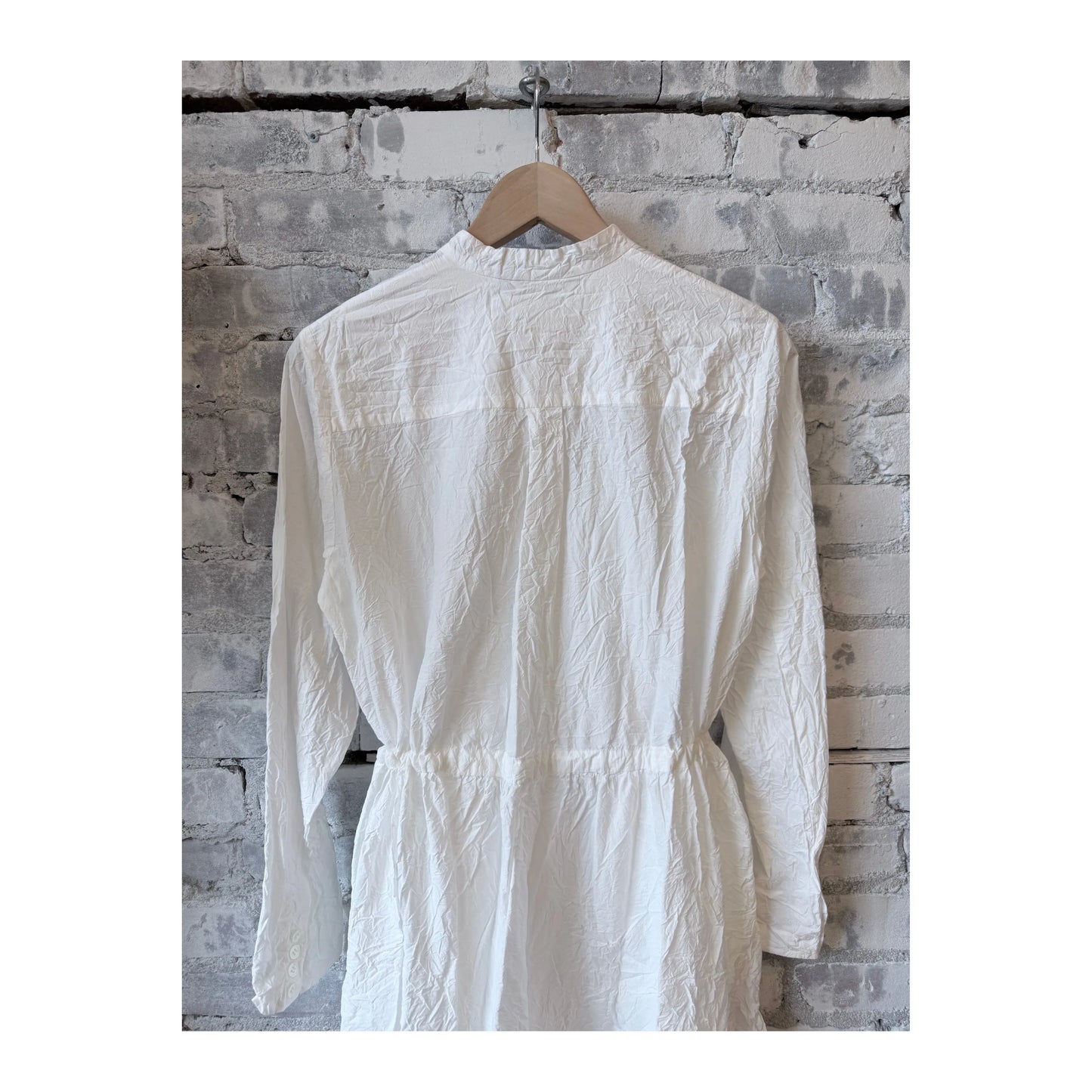 White cotton typewriter dress for women by Pas De Calais, featuring a classic, lightweight fabric and tailored fit.