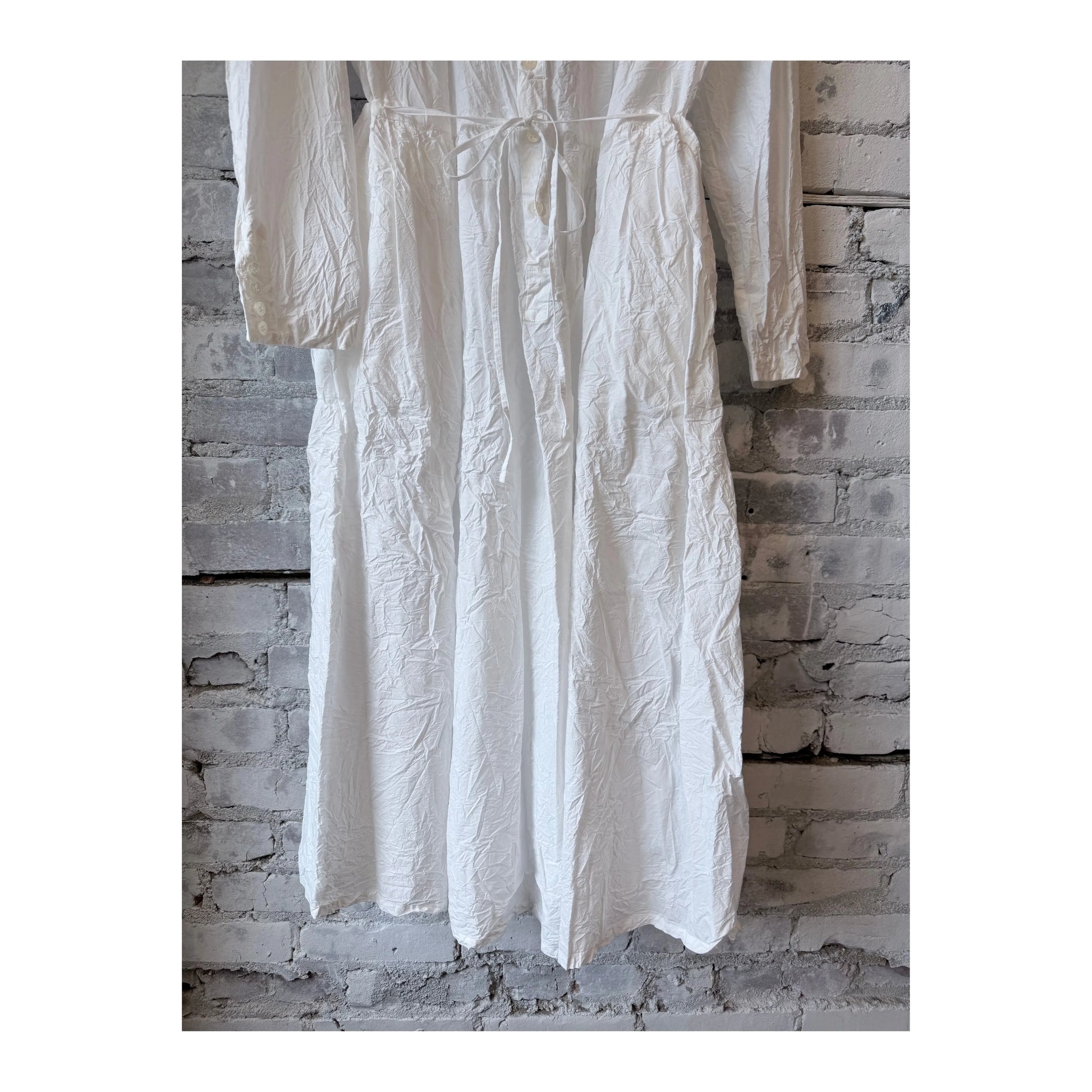 White Cotton Typewriter Dress for women by Pas De Calais, featuring a classic, textured fabric and elegant fit.