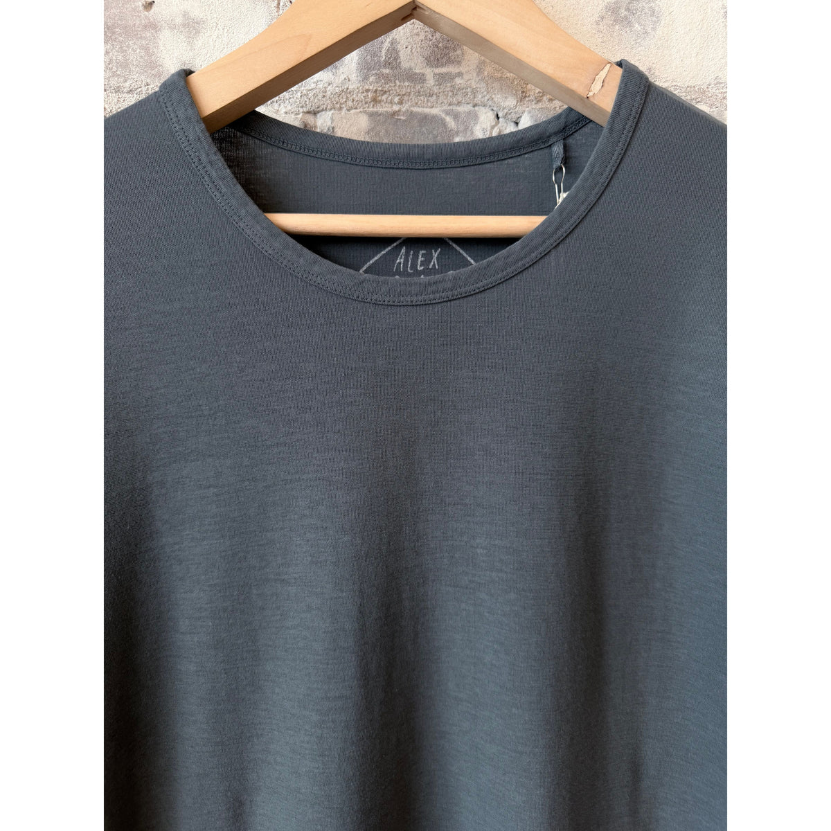 Men's Alex Crane Crepe Long Sleeve Tee in Lake, showcasing the soft fabric and relaxed fit.