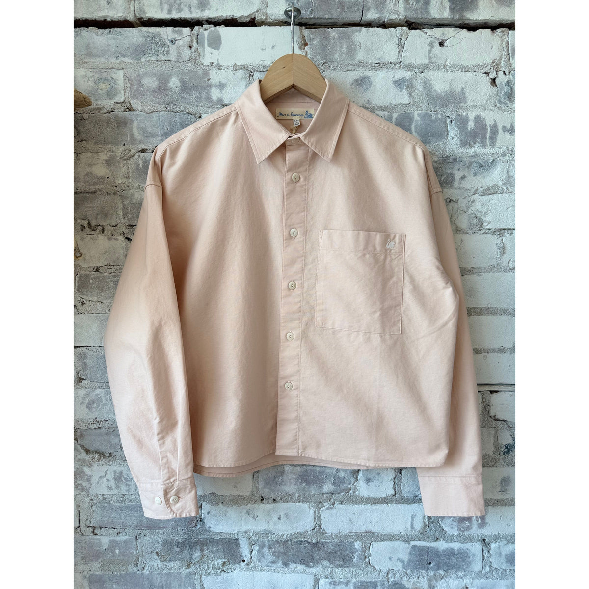 Women's cropped boxy cotton Oxford long sleeve shirt by Merz B. Schwanen, featuring a shell color with a classic button-up design.