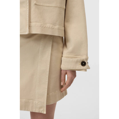 Women's cropped utility jacket in camel beige by Closed, featuring a stylish, functional design with multiple pockets and a relaxed fit.