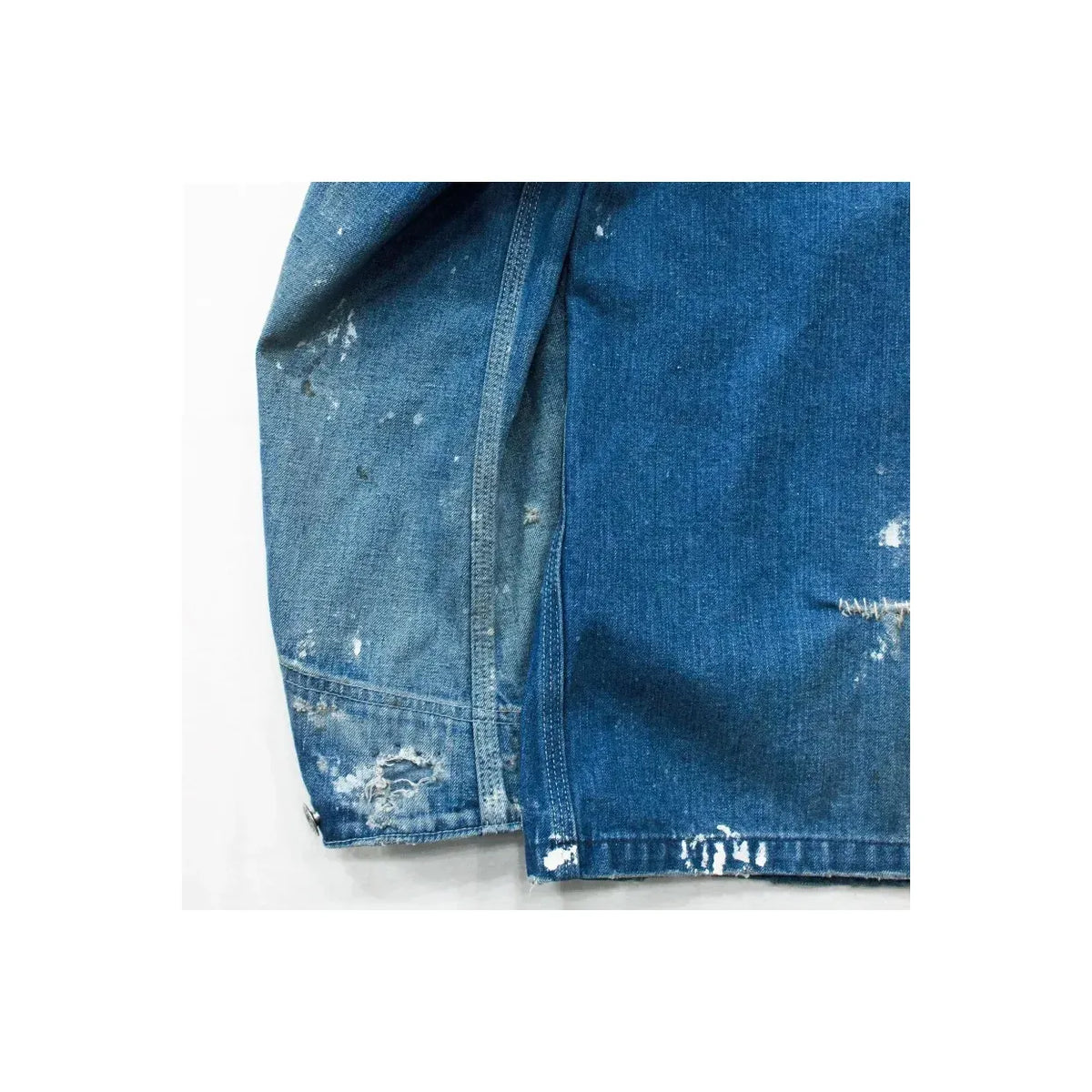 Men's customized indigo denim coverall jacket by H-Unit with front pockets and button closures, casual workwear style.