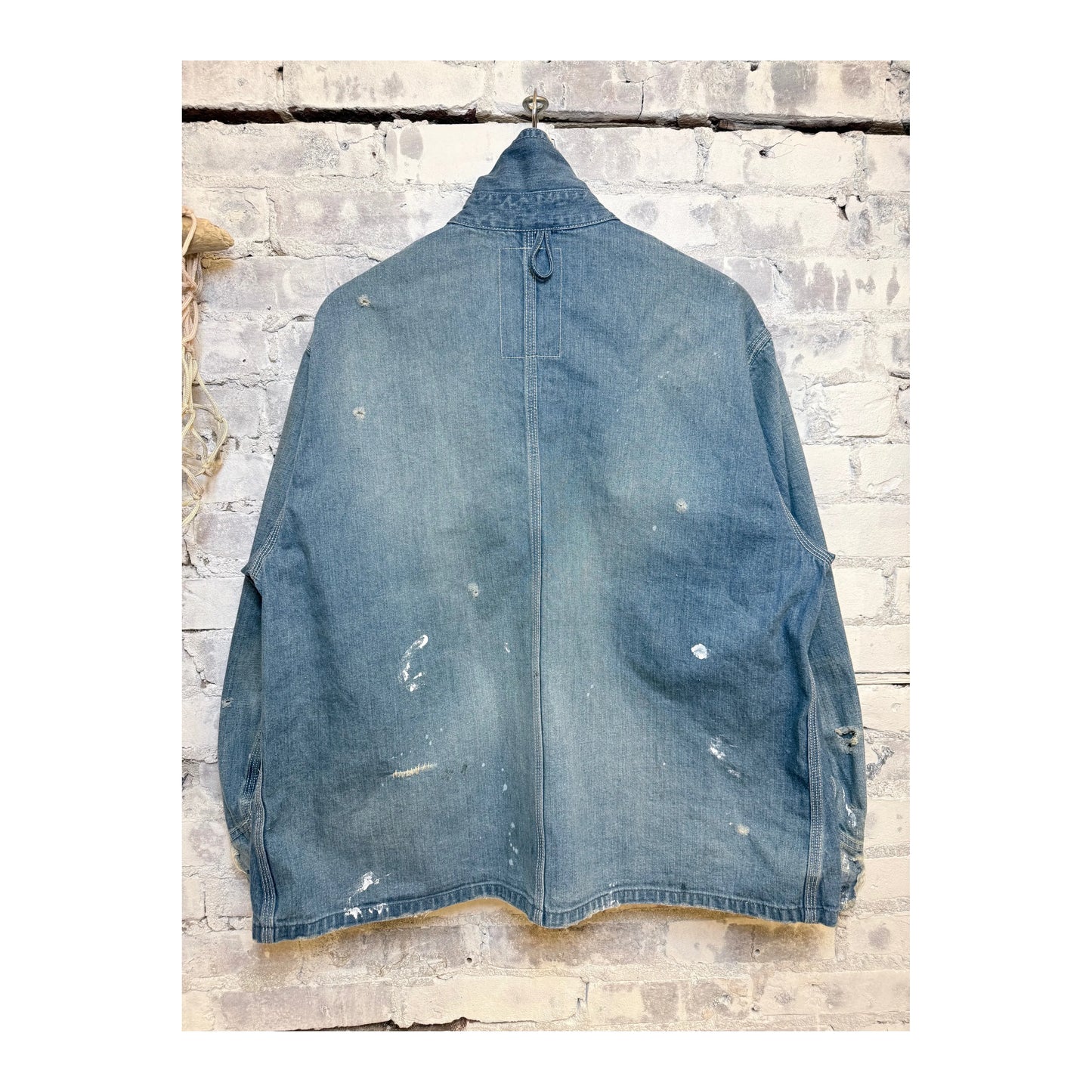 Men's customized indigo denim coverall jacket by H-Unit, featuring a classic fit with visible stitching and front pockets.
