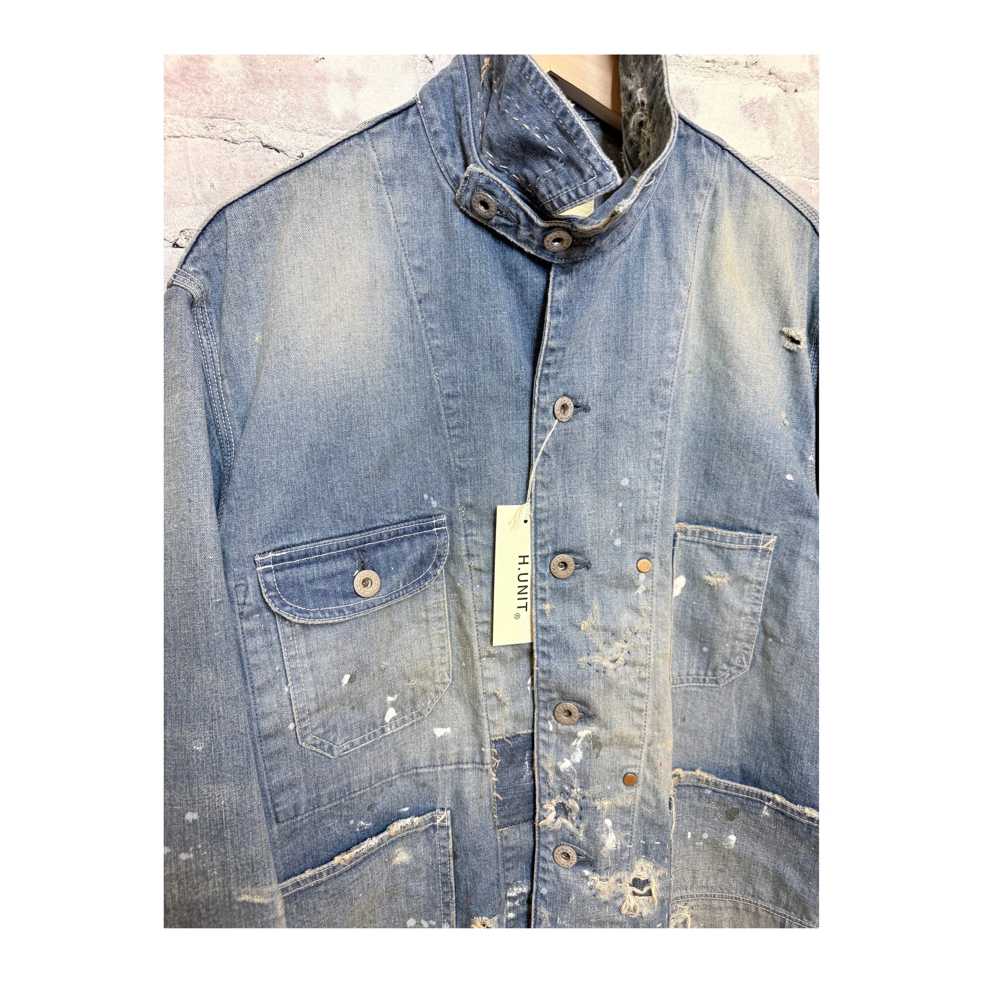 Men's customized indigo denim coverall jacket by H-Unit, featuring a classic fit with visible stitching and front pockets.