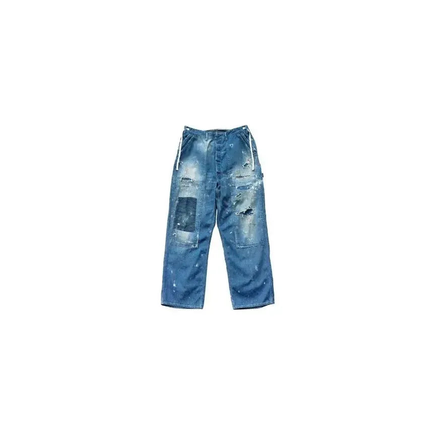 Men's customized side open Panther pants in denim by H-Unit, featuring unique design details and a relaxed fit.