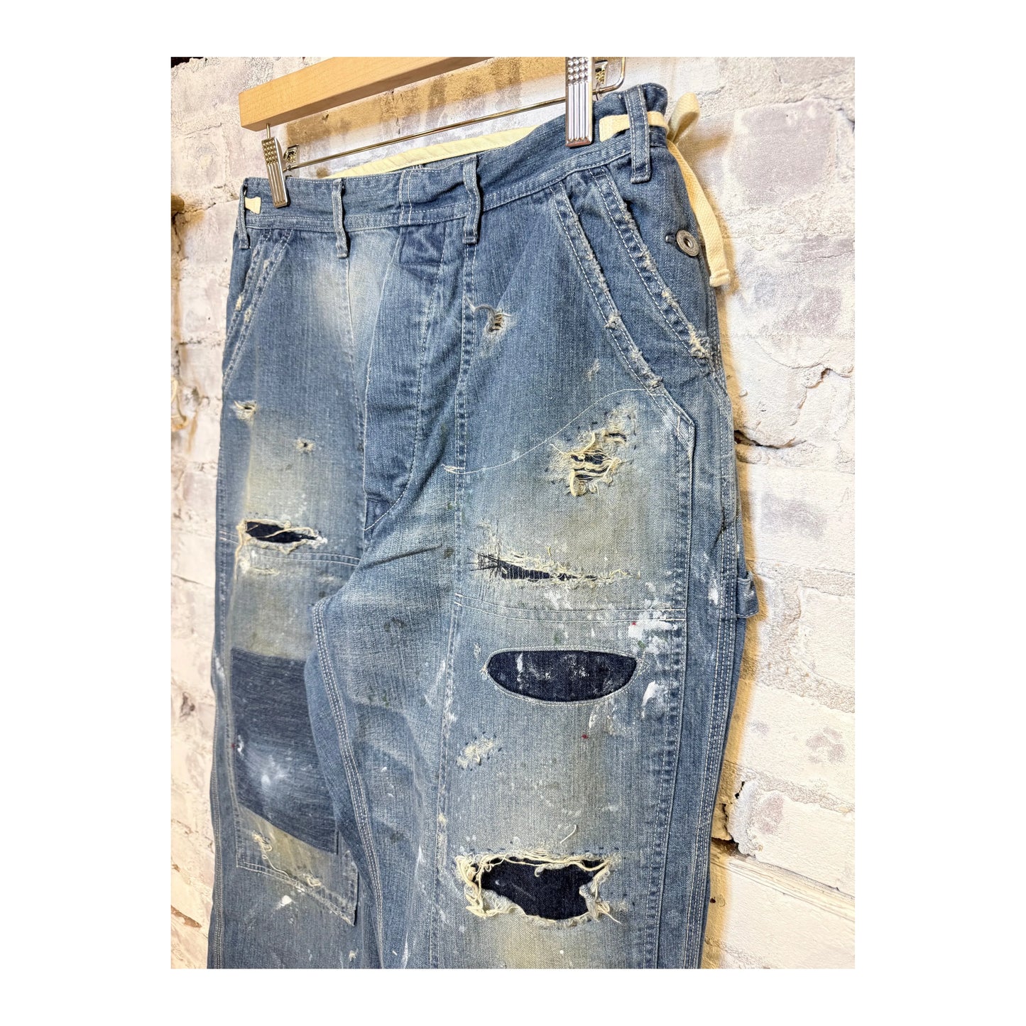 Men's customized side open panther denim pants by H-Unit featuring unique design and stylish fit.